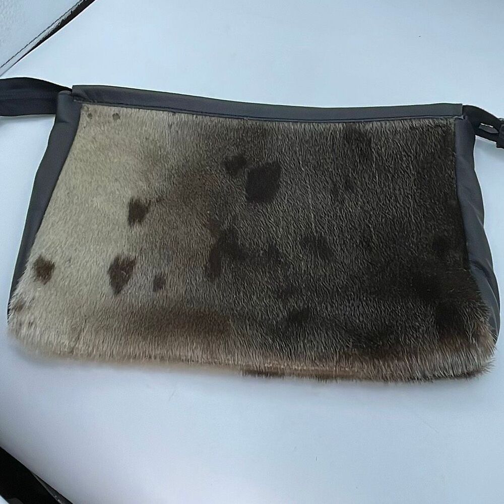 Artisan made faux fur clutch -travel bag.